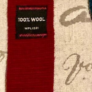 Burgundy Knit Tie, Great with pattern shirt 
Stored non-smoking home.